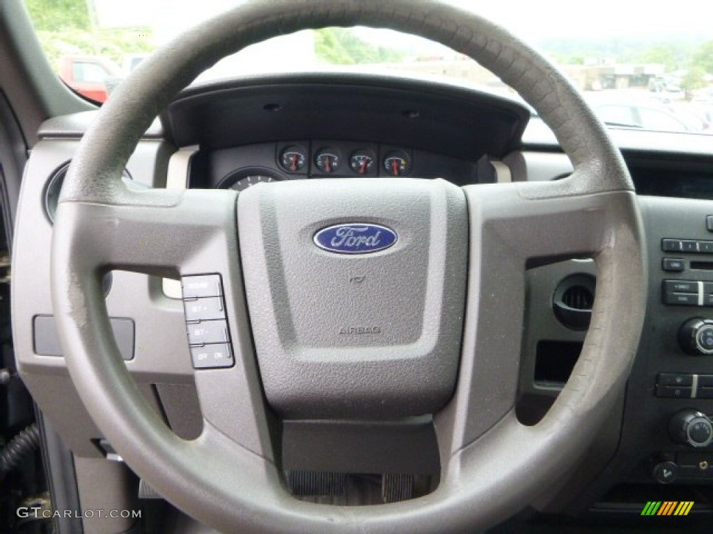 2010 F150 STX Regular Cab 4x4 - Tuxedo Black / Medium Stone photo #12