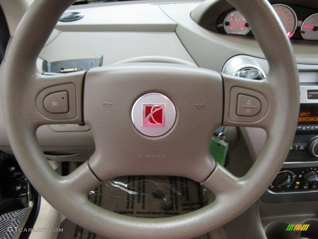 2007 Saturn ION 3 Sedan Tan Steering Wheel Photo #82053855