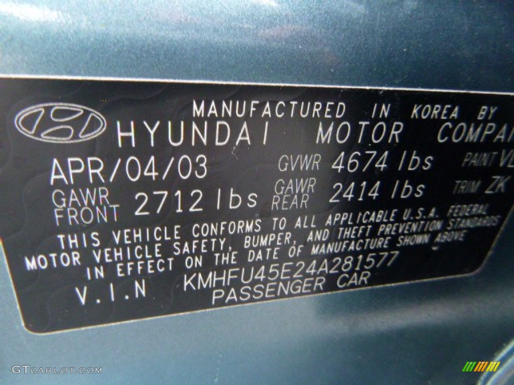 2004 XG350 Sedan - Celadon Green Metallic / Beige photo #24