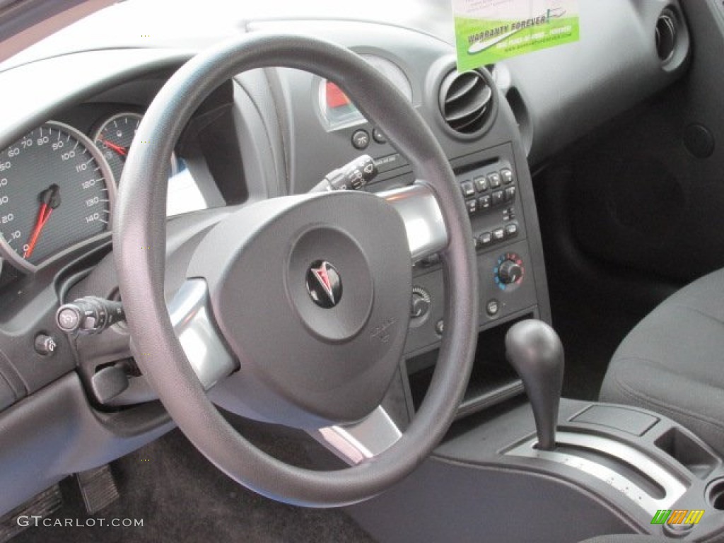 2006 Grand Prix Sedan - Blue Green Crystal / Ebony photo #14