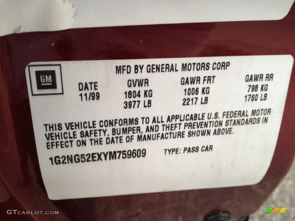 2000 Grand Am SE Sedan - Redfire Metallic / Dark Pewter photo #11