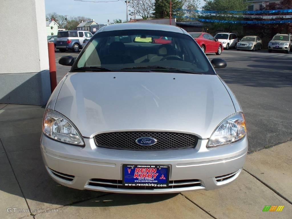 Silver Frost Metallic Ford Taurus