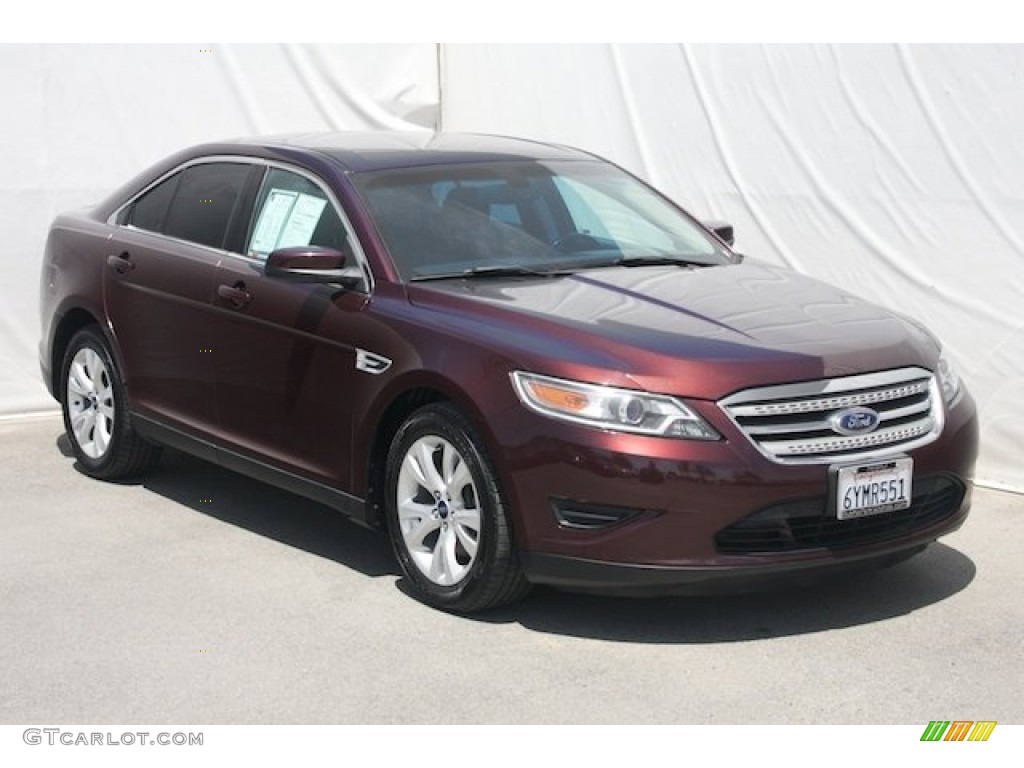 2010 Taurus SEL - Cinnamon Red Metallic / Charcoal Black photo #6