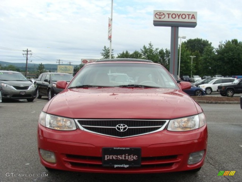 2000 Solara SE V6 Coupe - Red Flame Metallic / Ivory photo #2