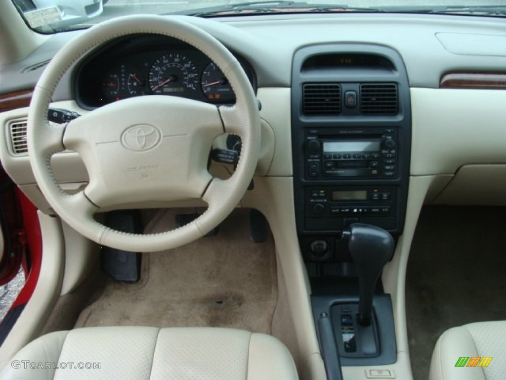 2000 Solara SE V6 Coupe - Red Flame Metallic / Ivory photo #9