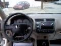 Beige 2002 Honda Civic LX Coupe Dashboard