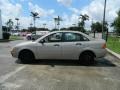 2006 Pueblo Gold Metallic Ford Focus ZX4 SE Sedan  photo #6