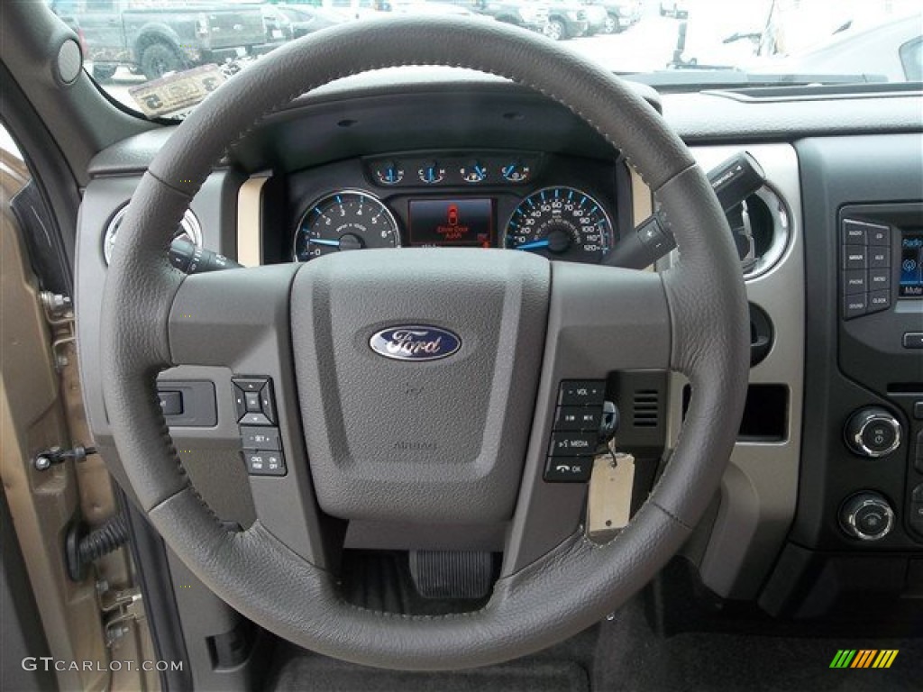 2013 Ford F150 XLT SuperCab Adobe Steering Wheel Photo #82358485