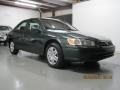 Woodland Pearl - Camry LE Photo No. 10