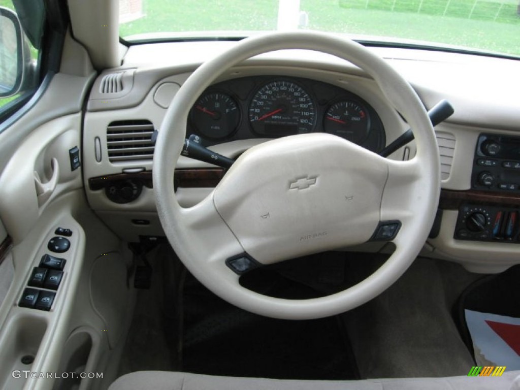 2004 Chevrolet Impala Standard Impala Model Neutral Beige Steering Wheel Photo #82393251