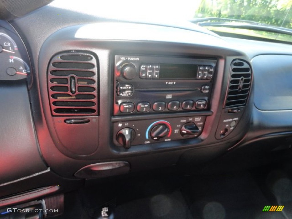 2003 F150 Heritage Edition Supercab 4x4 - Toreador Red Metallic / Black/Red photo #7