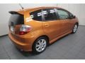 2010 Orange Revolution Metallic Honda Fit Sport  photo #11