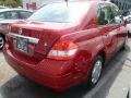 2009 Red Brick Nissan Versa 1.8 S Sedan  photo #5