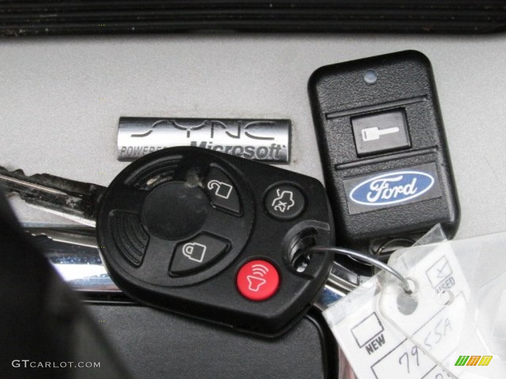 2009 Escape XLT V6 4WD - Black Pearl Slate Metallic / Stone photo #21