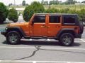 Mango Tango Pearl - Wrangler Unlimited Mountain Edition 4x4 Photo No. 2