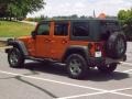 Mango Tango Pearl - Wrangler Unlimited Mountain Edition 4x4 Photo No. 3
