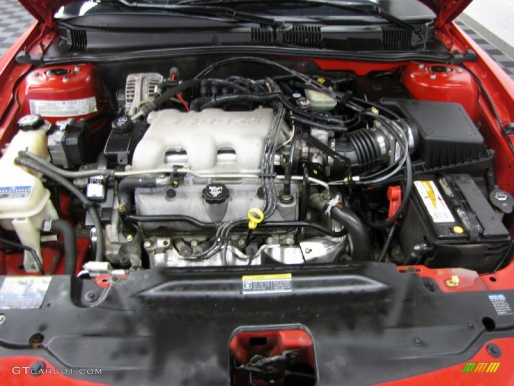 2004 Grand Am SE Sedan - Victory Red / Dark Pewter photo #5