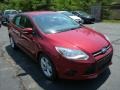 2013 Ruby Red Ford Focus SE Sedan  photo #1