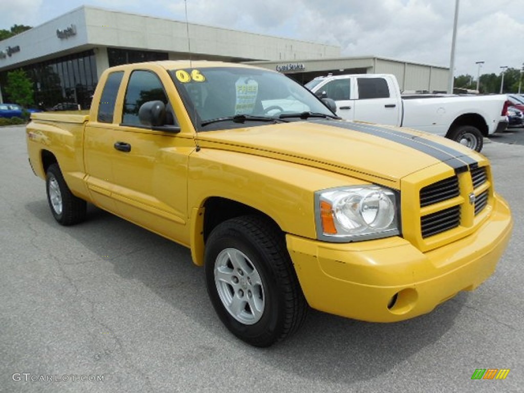 Solar Yellow 2006 Dodge Dakota SLT Sport Club Cab Exterior Photo #82634465