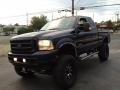 Black 2003 Ford F250 Super Duty Lariat SuperCab 4x4