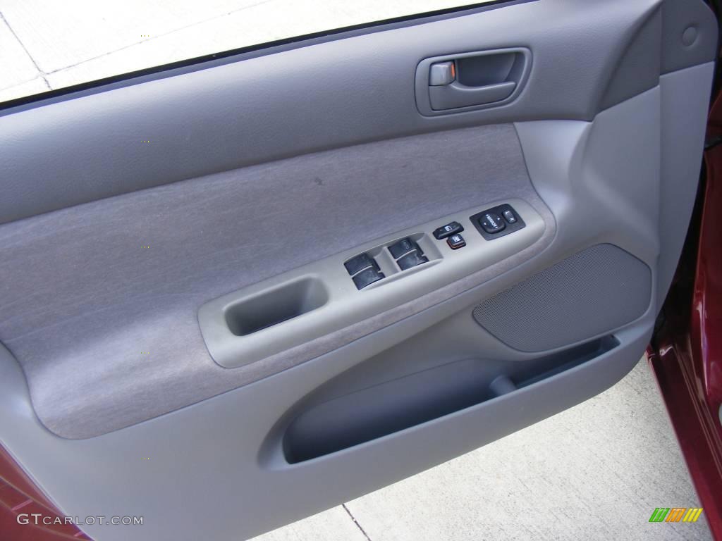2003 Camry LE - Salsa Red Pearl / Stone photo #36