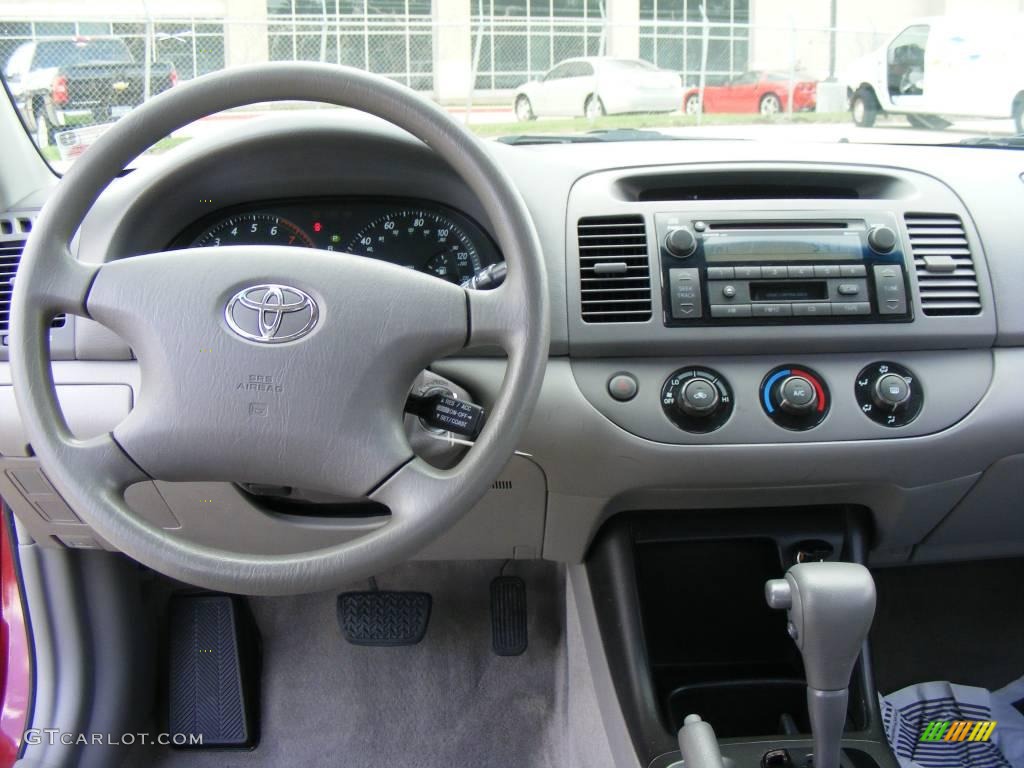 2003 Camry LE - Salsa Red Pearl / Stone photo #40