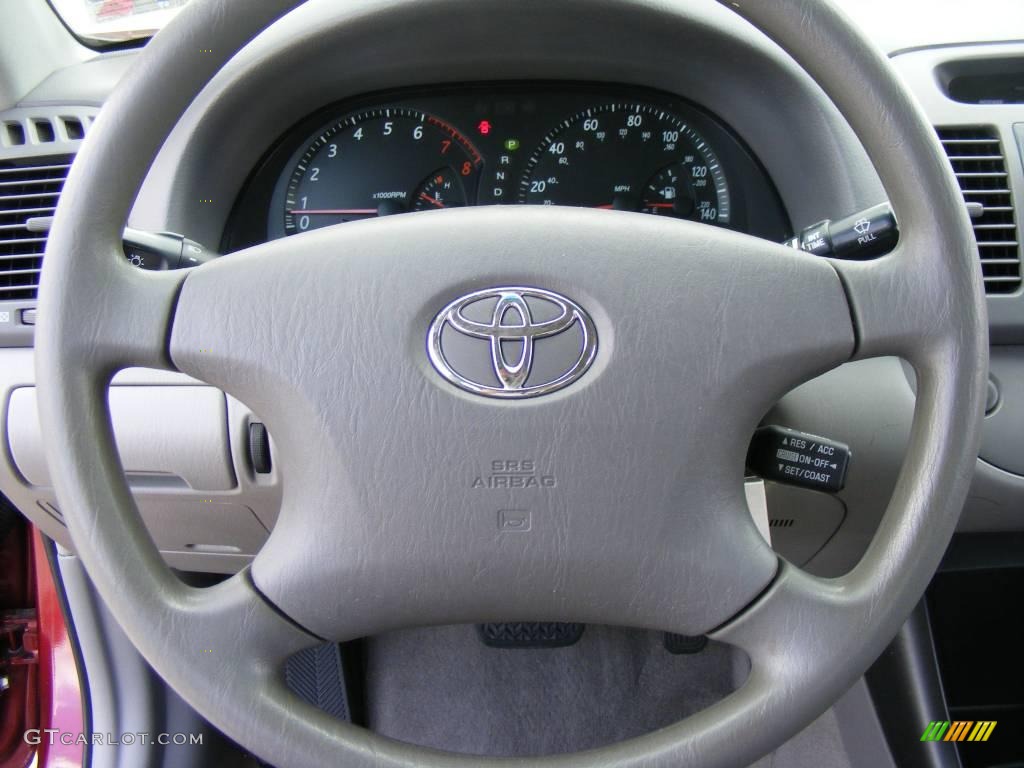 2003 Camry LE - Salsa Red Pearl / Stone photo #45