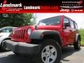 2009 Flame Red Jeep Wrangler Unlimited X  photo #1