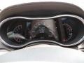 2014 Jeep Grand Cherokee Overland Nepal Jeep Brown Light Frost Interior Gauges Photo