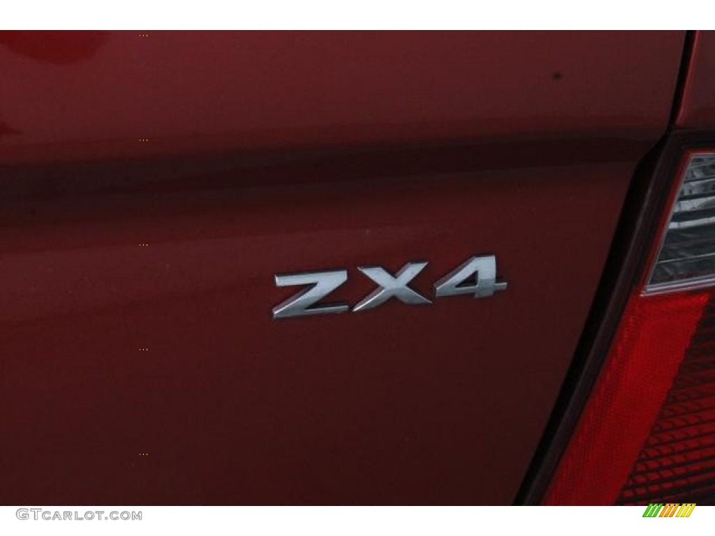 2005 Focus ZX4 S Sedan - Sangria Red Metallic / Dark Flint/Light Flint photo #16