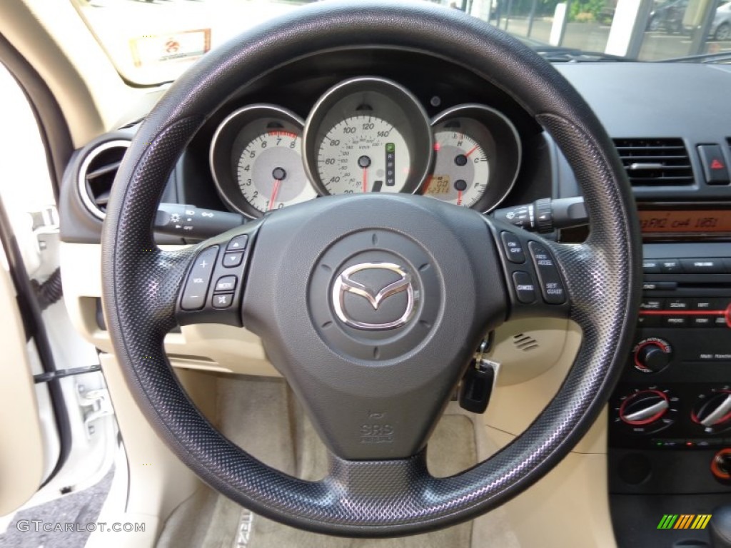 2007 Mazda MAZDA3 i Sport Sedan Beige Steering Wheel Photo #82729015