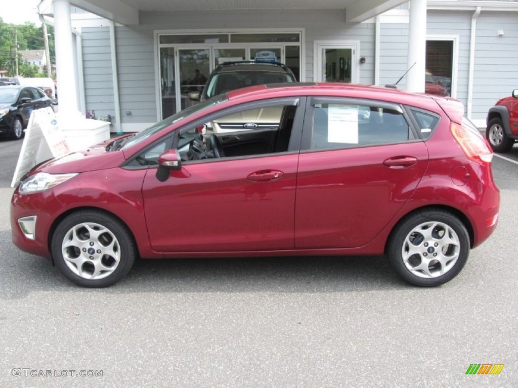 2011 Fiesta SES Hatchback - Bright Magenta Metallic / Charcoal Black/Blue Cloth photo #4