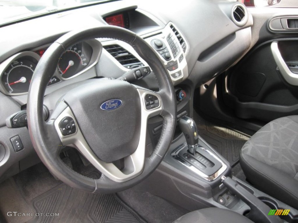 2011 Fiesta SES Hatchback - Bright Magenta Metallic / Charcoal Black/Blue Cloth photo #10