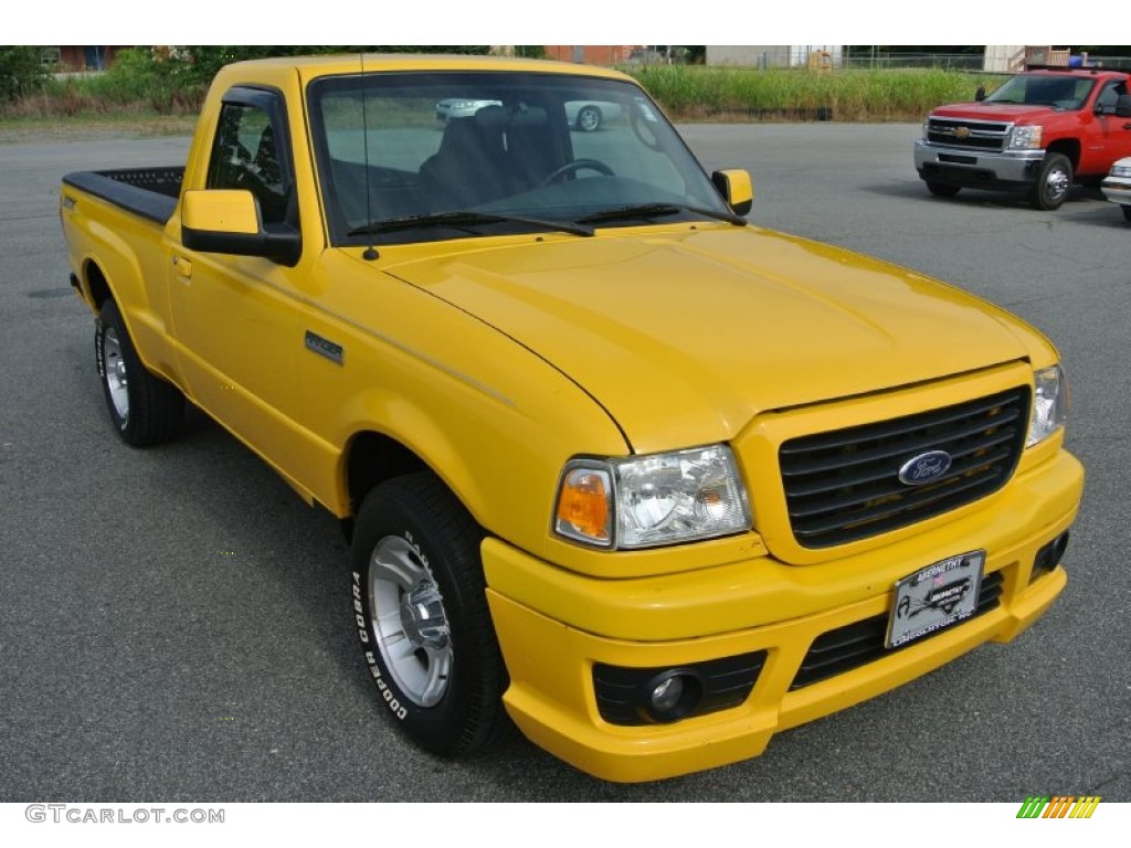 2006 Ranger STX Regular Cab - Screaming Yellow / Ebony Black/Blue photo #1