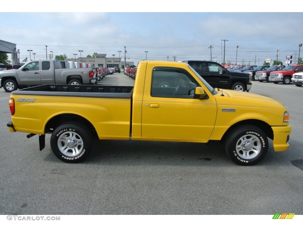 2006 Ranger STX Regular Cab - Screaming Yellow / Ebony Black/Blue photo #6