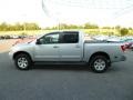 2005 Radiant Silver Nissan Titan LE Crew Cab 4x4  photo #4