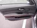 2010 BMW 3 Series Black Interior Door Panel Photo