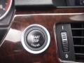 2010 BMW 3 Series Black Interior Controls Photo