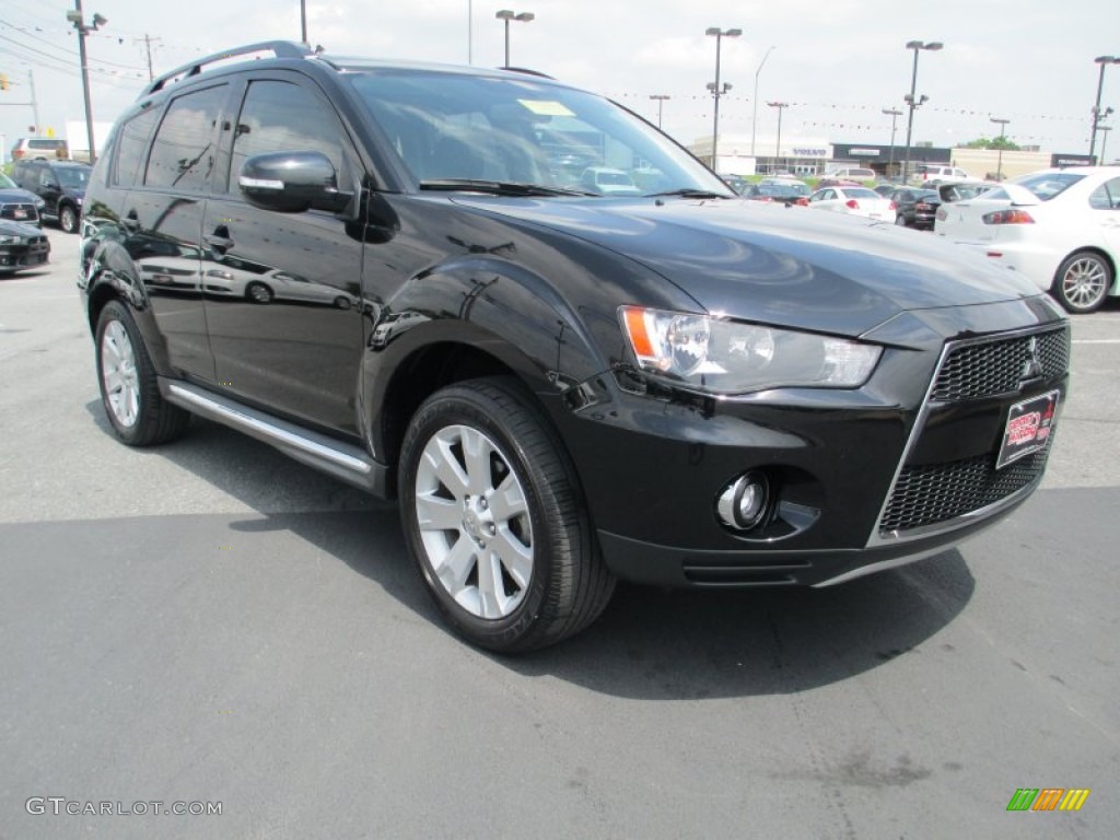 2011 Outlander SE AWD - Labrador Black Pearl / Black photo #1