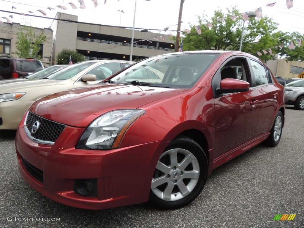 2010 Sentra 2.0 SR - Anodized Orange Metallic / Charcoal photo #1