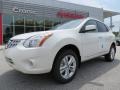 2013 Pearl White Nissan Rogue SV  photo #1