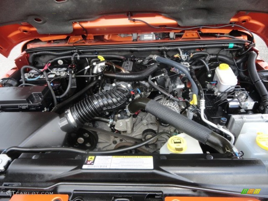 2011 Wrangler Sahara 4x4 - Mango Tango Pearl / Black photo #12