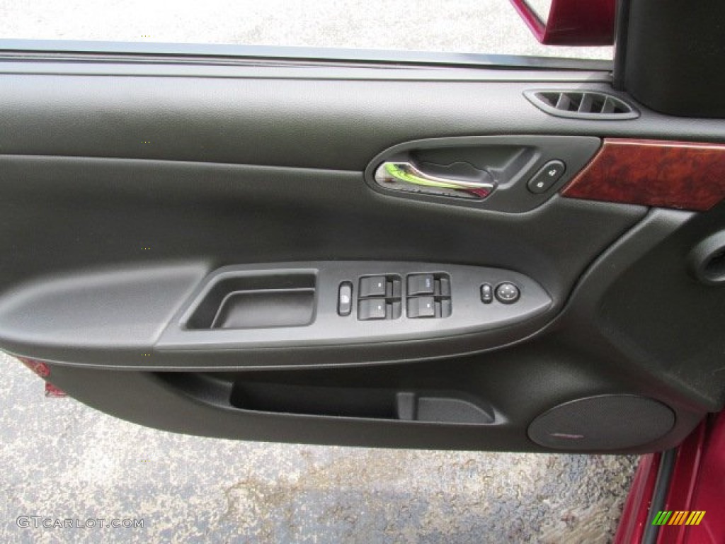 2009 Chevrolet Impala LT Ebony Door Panel Photo #82893395