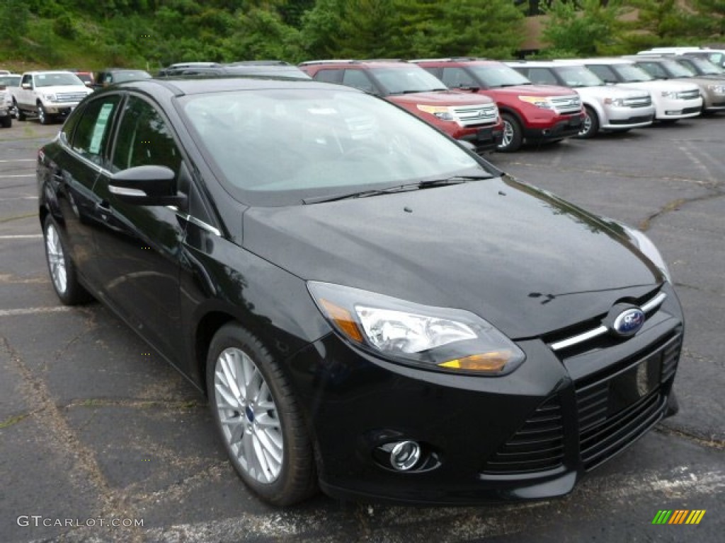 2013 Focus Titanium Sedan - Tuxedo Black / Tuscany Red photo #1