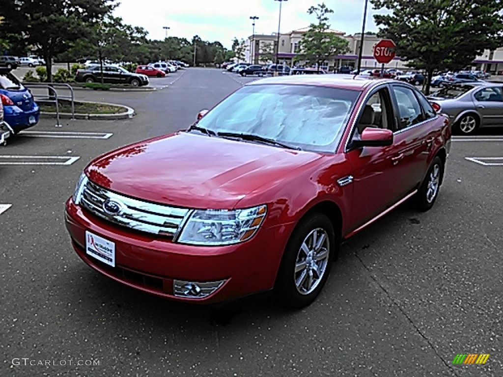 2009 Taurus SEL AWD - Sangria Red Metallic / Camel photo #1