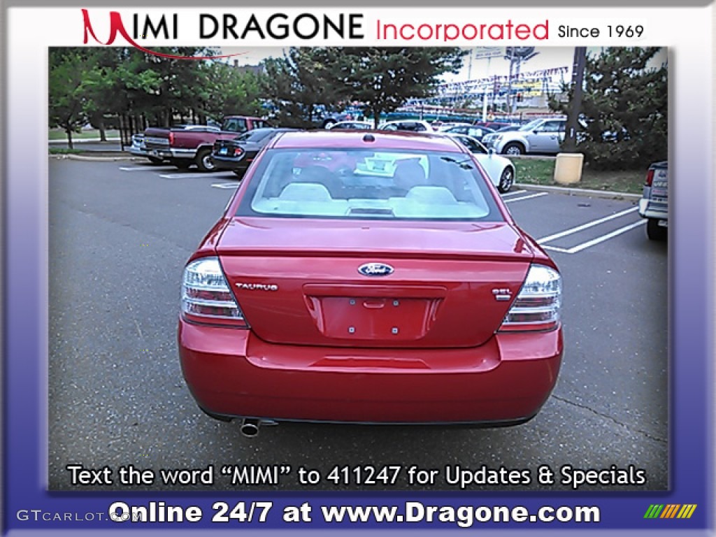 2009 Taurus SEL AWD - Sangria Red Metallic / Camel photo #7