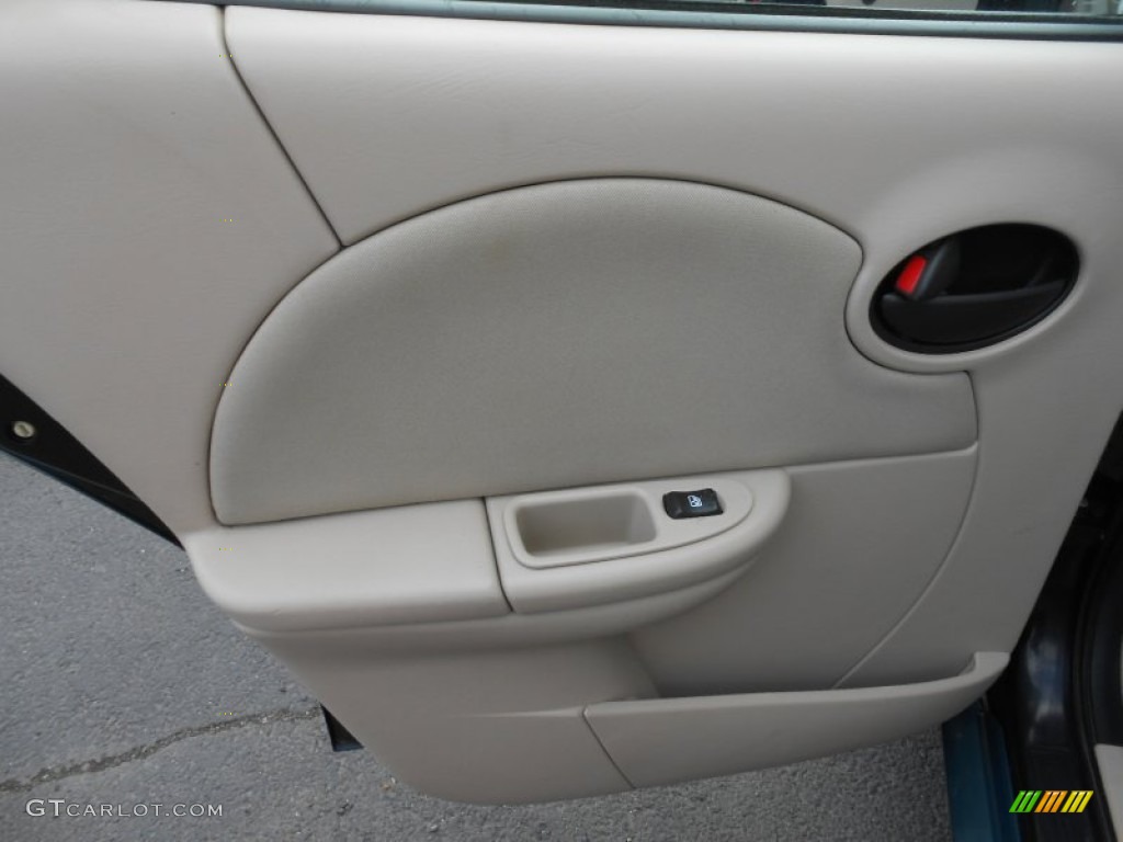 2006 Saturn ION 2 Sedan Beige Door Panel Photo #82936881