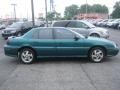 1997 Medium Green Blue Metallic Pontiac Grand Am SE Sedan  photo #2