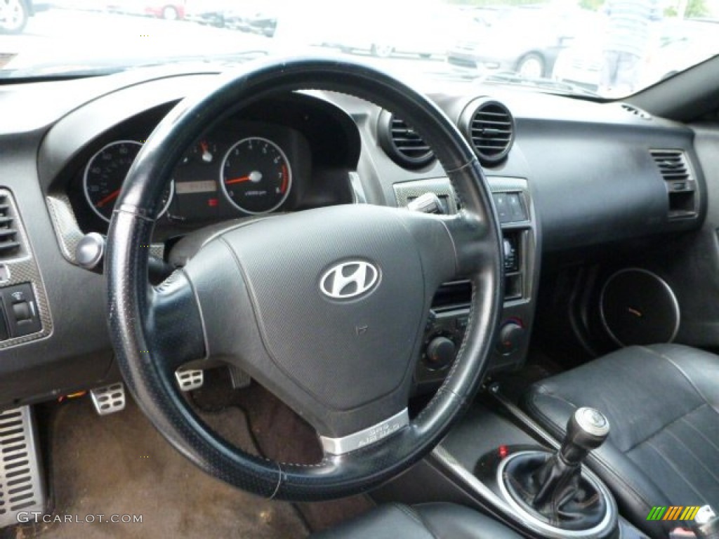 2003 Tiburon GT V6 - Super Silver / Black photo #13
