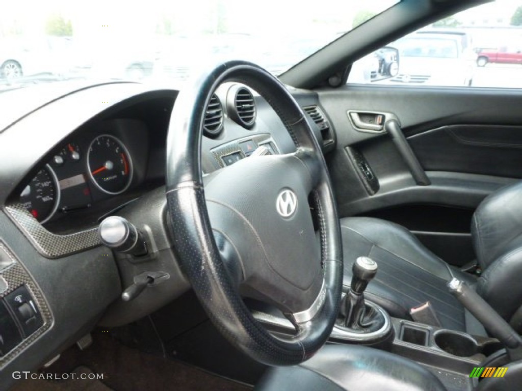2003 Tiburon GT V6 - Super Silver / Black photo #19